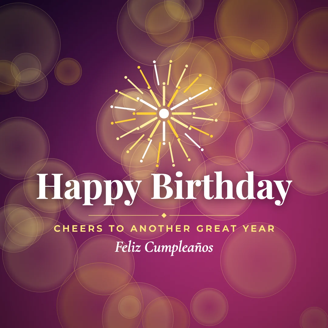 Happy Birthday greeting image in bokeh lights style with the wish “Cheers to another great year” and the greeting in Spanish