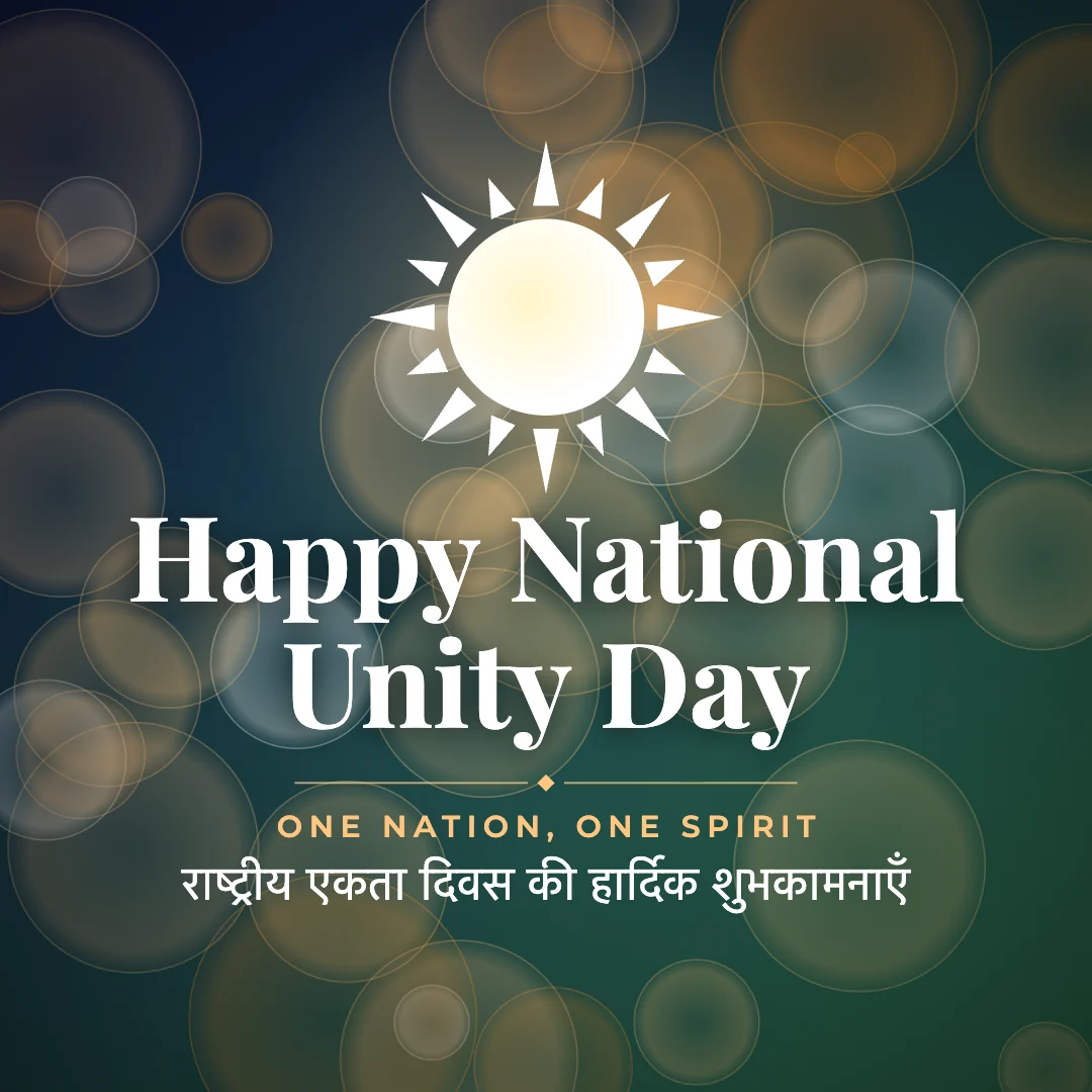 Happy National Unity Day greeting image in bokeh lights style with the wish “One nation, one spirit” and the greeting in Hindi
