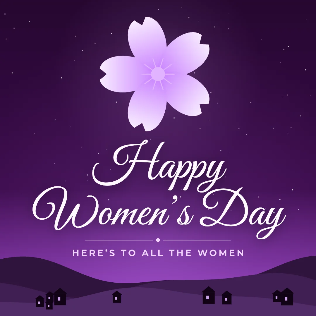 Happy Women’s Day greeting image in night skyline style with the wish “Here’s to all the women”
